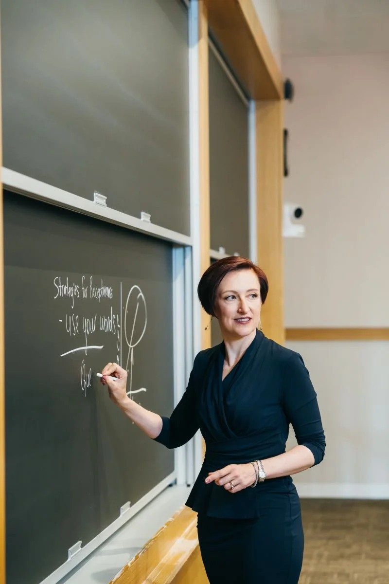 HKS Prof Julia Minson at the blackboard