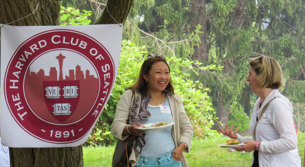 Annual Picnic with banner and guests